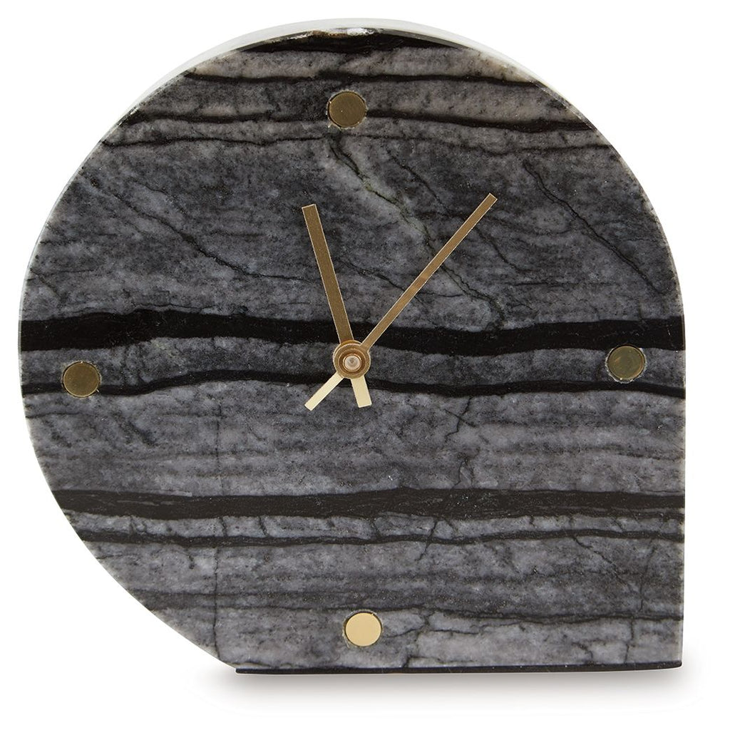 Table clock front, dark gray arched face with gold hands, striped texture, and dots