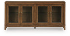 Medium brown wood accent cabinet with four glass doors and brass handle detail