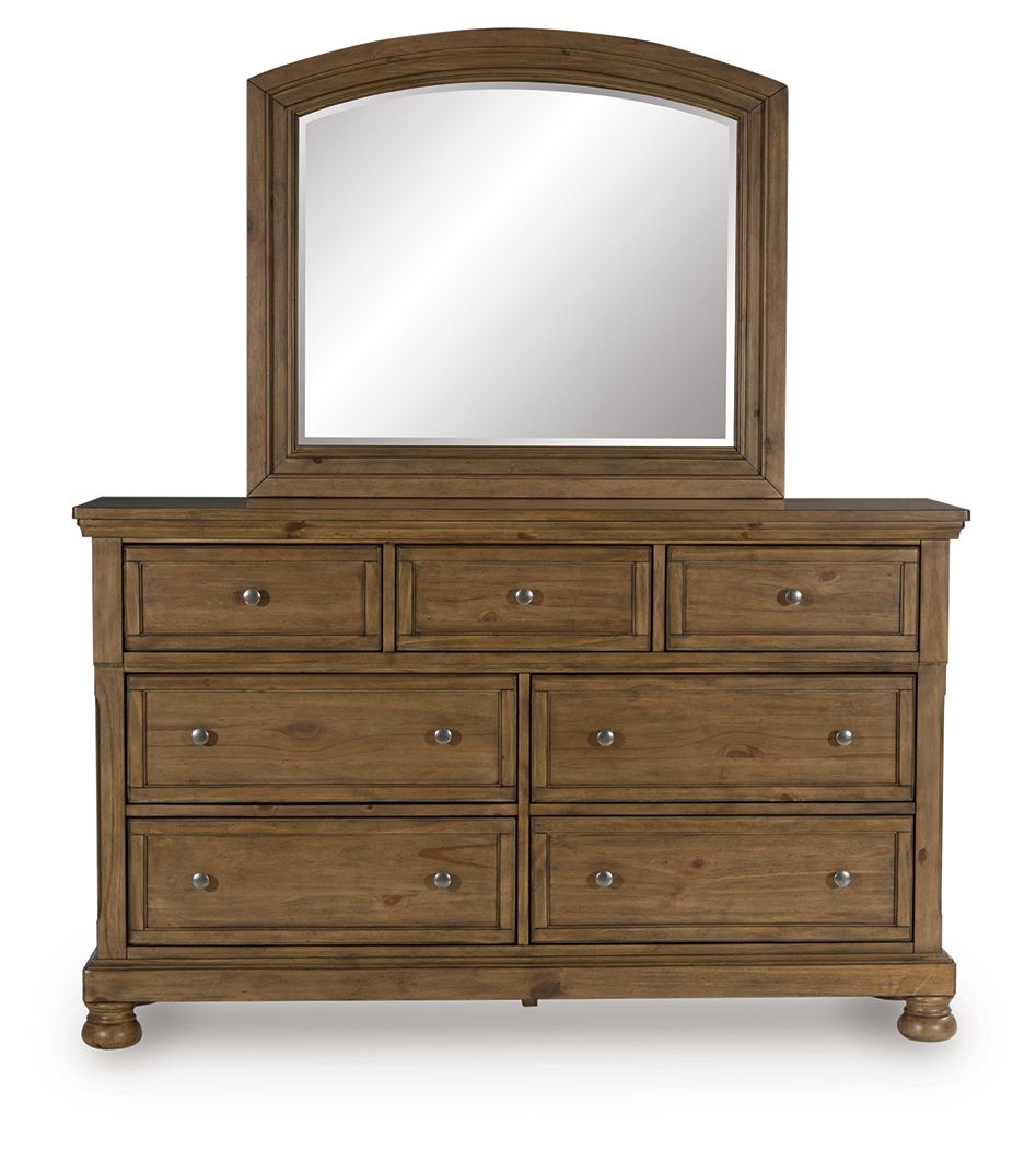 Medium brown dresser with arched mirror and multiple drawers