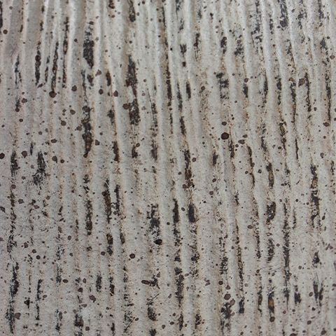 Ceramic vase wall texture with vertical streaking and scattered speckles in light gray