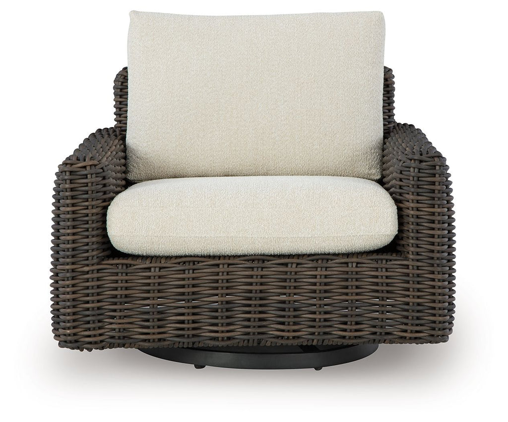 Dark brown wicker swivel glider lounge chair with beige seat cushion and backrest