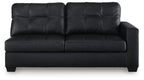 Dark sofa with tufted back, smooth seat, and square padded arms with legs