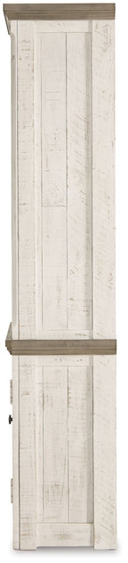 Left pier cabinet with tall panel doors, weathered beige finish