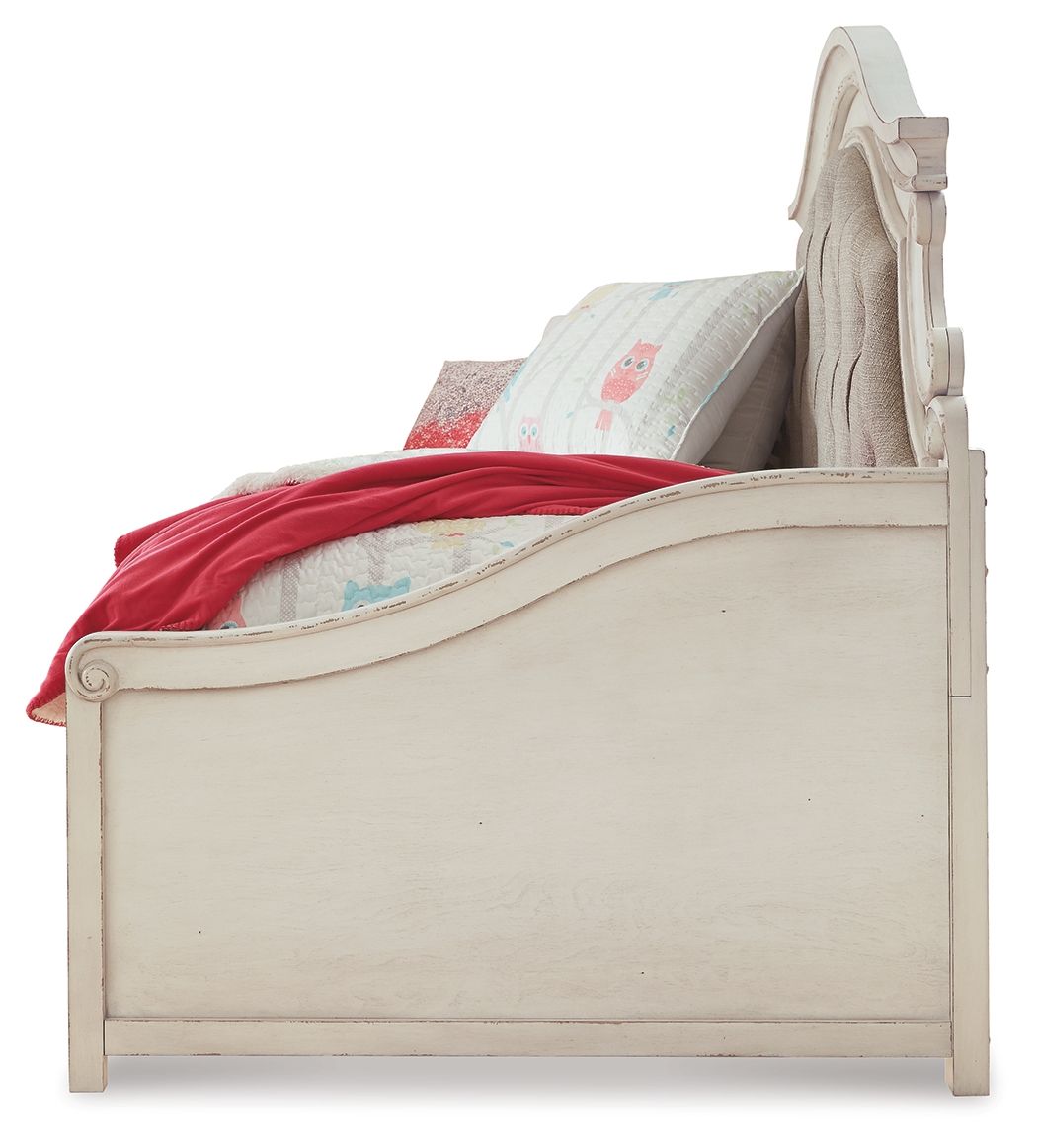 Twin day bed with storage, chipped white frame, curved footboard and headboard