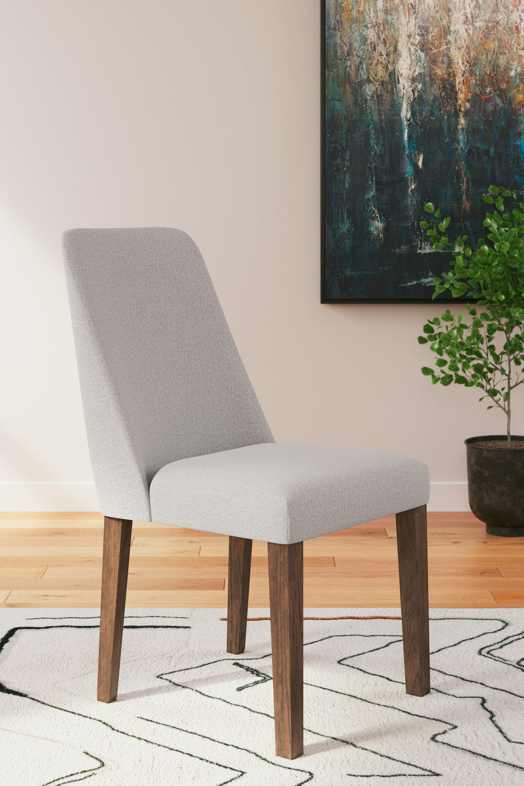 Upholstered dining chair with light gray fabric and dark wood legs