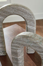 Taupe stone arch decor set of 2 on wood surface, one angled view