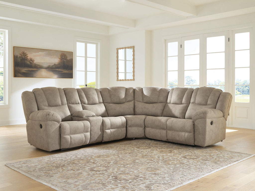 Birch reclining sectional sofa with padded arms, tufted back, and reclining seats