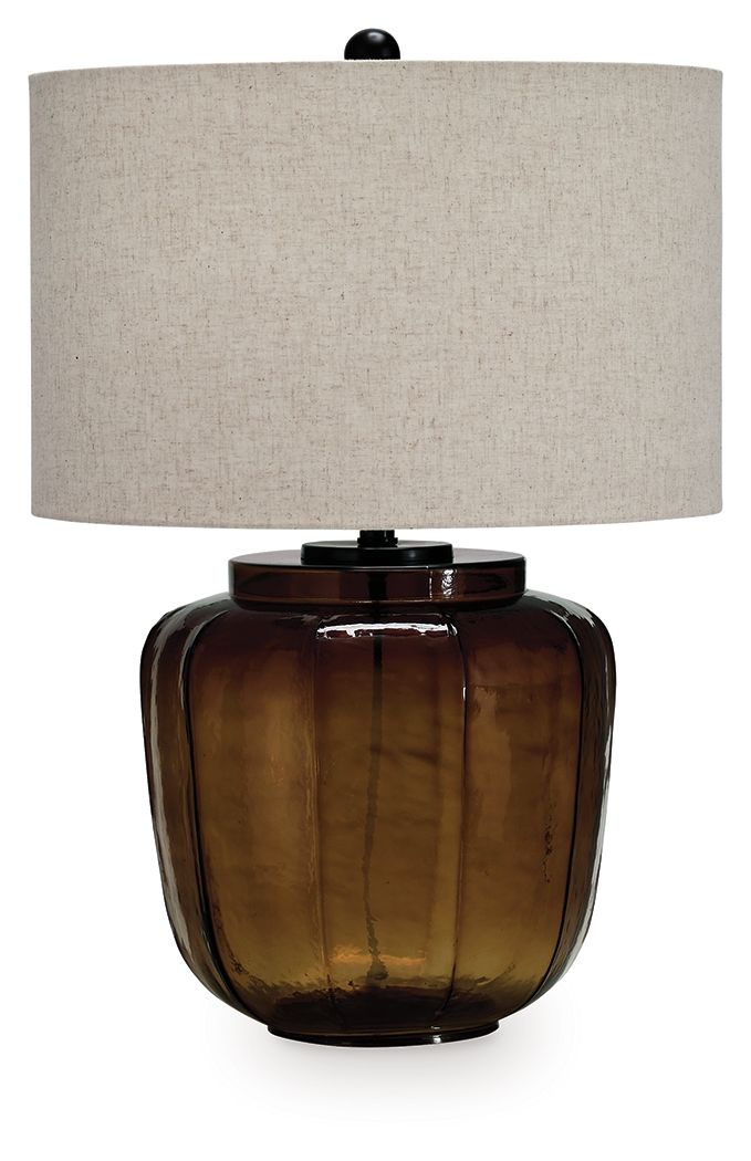 Amber glass table lamp with rounded base and beige fabric drum shade