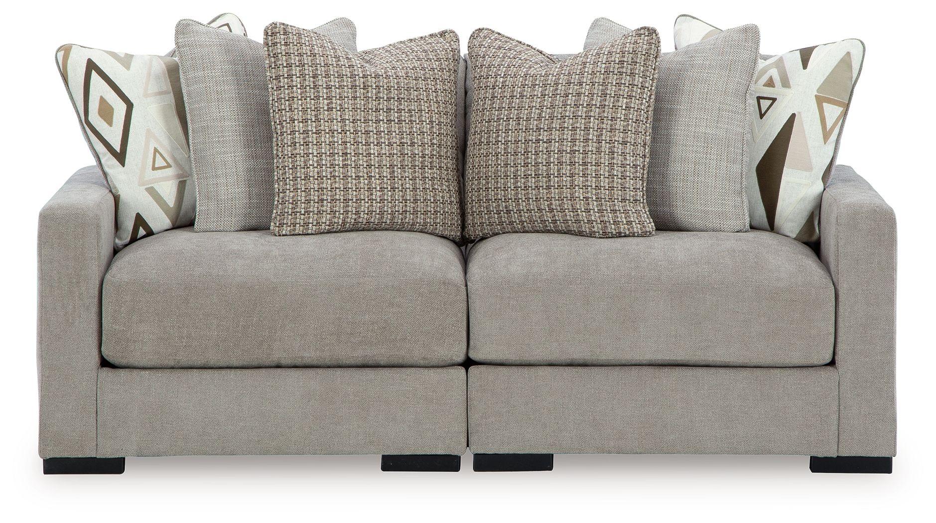Pebble gray sectional sofa with back cushions and geometric accent pillows
