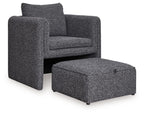 Charcoal accent chair with ottoman, textured fabric, tall back cushion and rounded arms