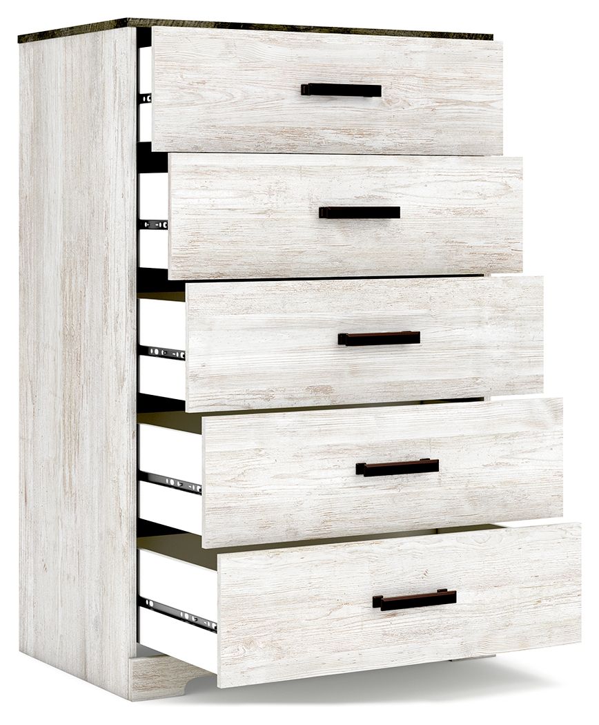 Whitewash drawer chest with five drawers and dark bar handles, angled view