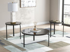 Black round occasional table set of 3 shown in living room, with dark metal legs