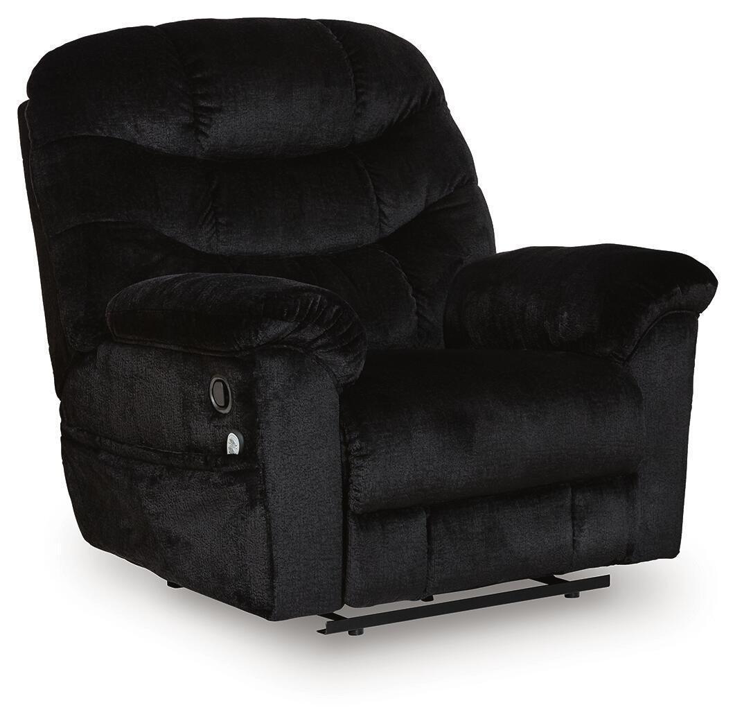 Black upholstered zero-wall recliner chair with tufted back, padded arms, and footrest base