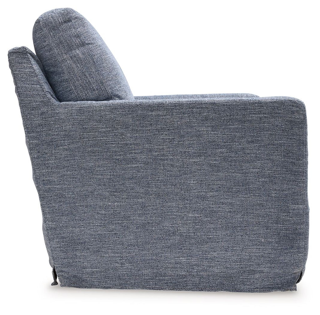 Blue upholstered swivel glider accent chair angled side view with tall back and arms
