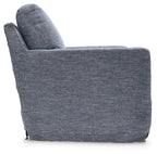Blue upholstered swivel glider accent chair angled side view with tall back and arms