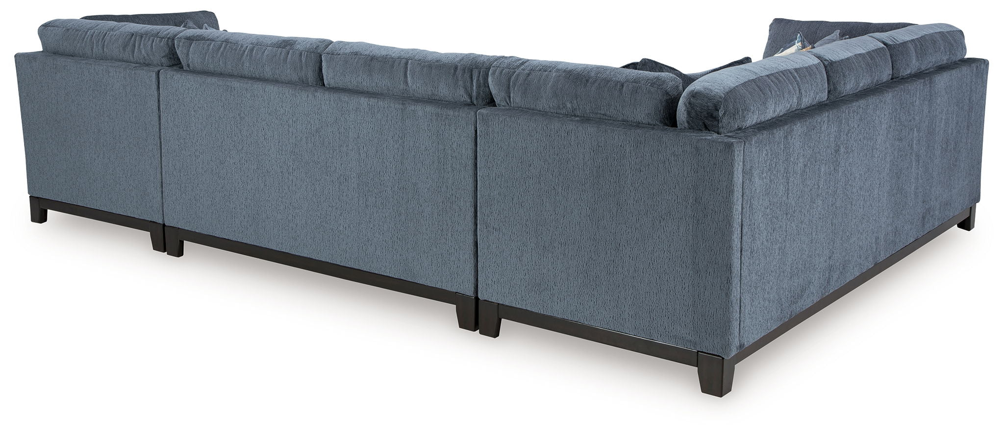Blue sectional sofa with wide chaise and tufted cushions