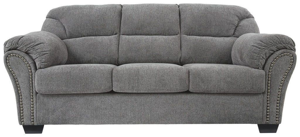 Pewter gray fabric sofa front view with tufted backrest and nailhead side trim