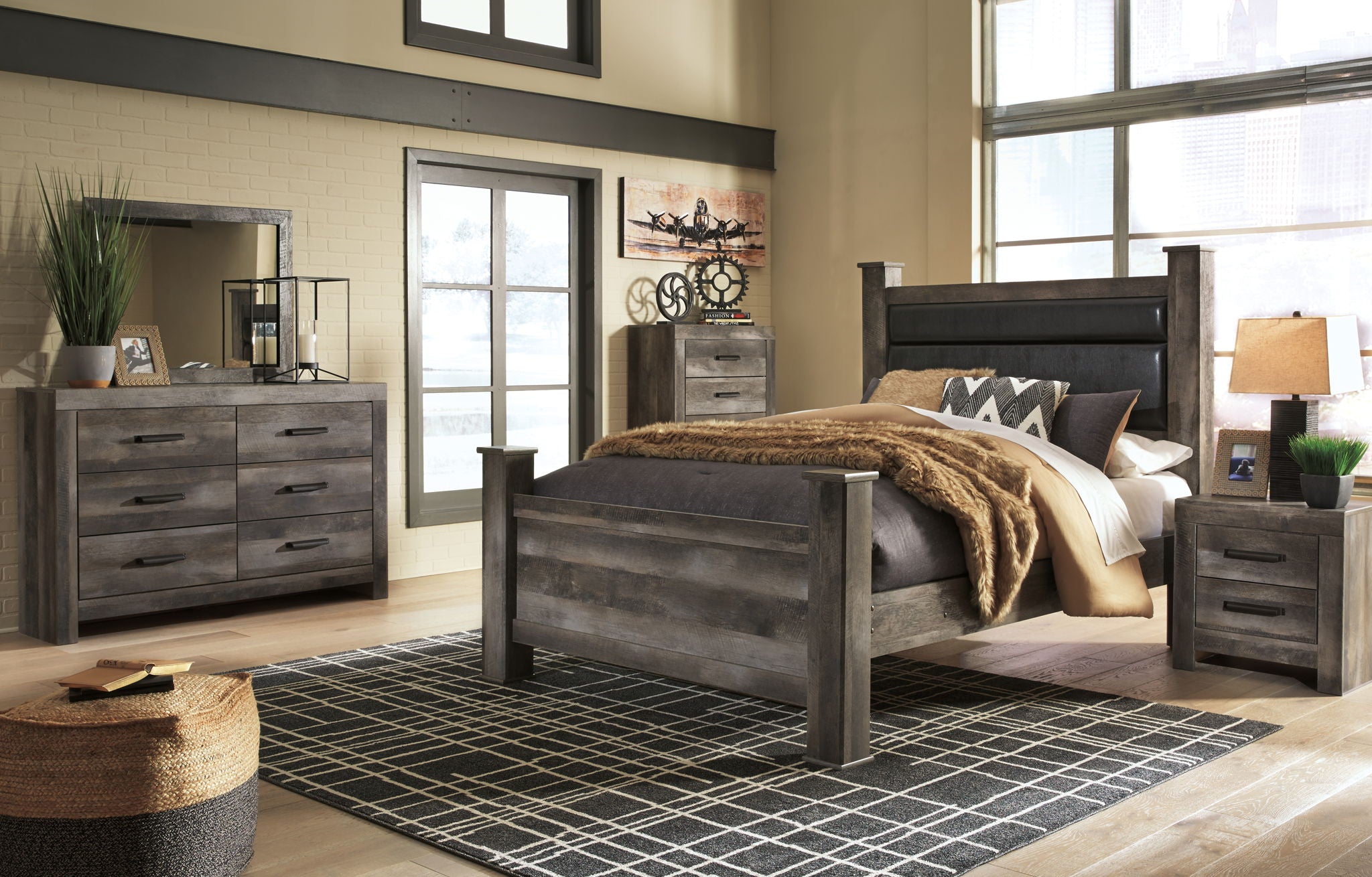 Gray bed frame with matching nightstands in bedroom set