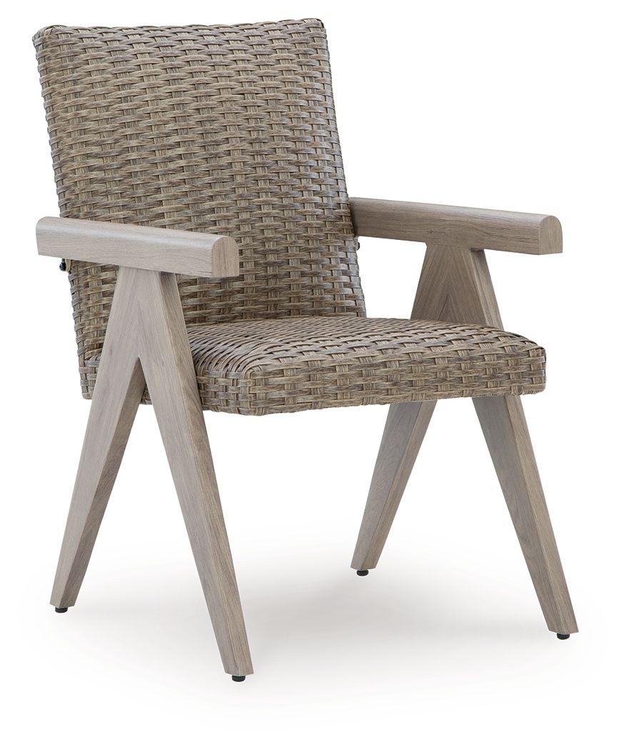 Beige woven arm chair with light wood armrests and angled legs