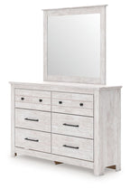 Whitewash six-drawer dresser with a tall mirror and black bar handles