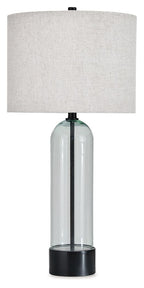 Clear glass table lamp with black base and linen fabric drum shade