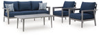 Patio seating set with navy loveseat and four armchairs, gray frames, and checkered pillows