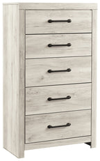 Close-up of whitewash chest drawers with black bar pulls