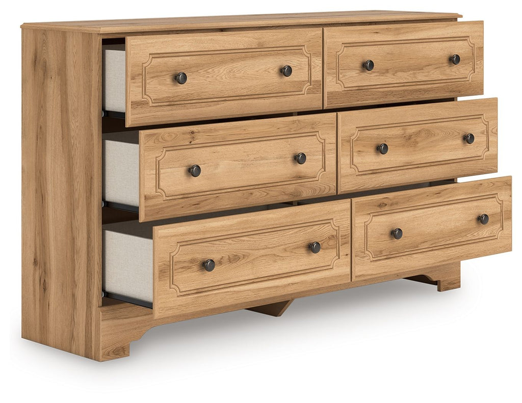 Aleaport dresser with light brown wood, mirror, and six drawers with round knobs