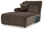 Chocolate press-back chaise lounge chair with ribbed fabric and throw pillows