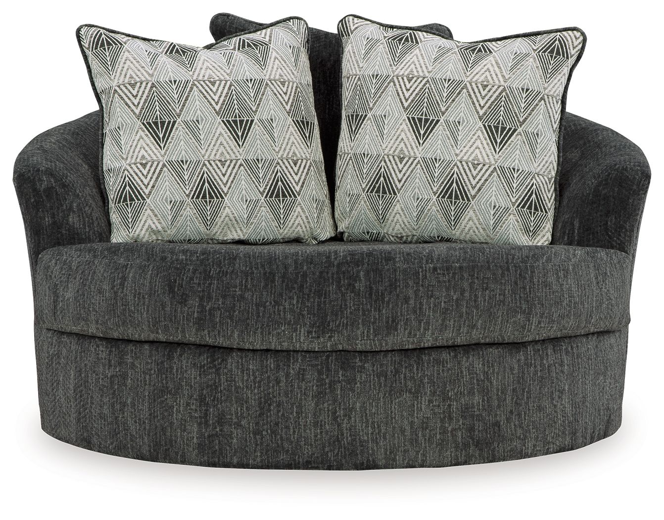 Oversized swivel accent chair in dark gray with two geometric patterned throw pillows