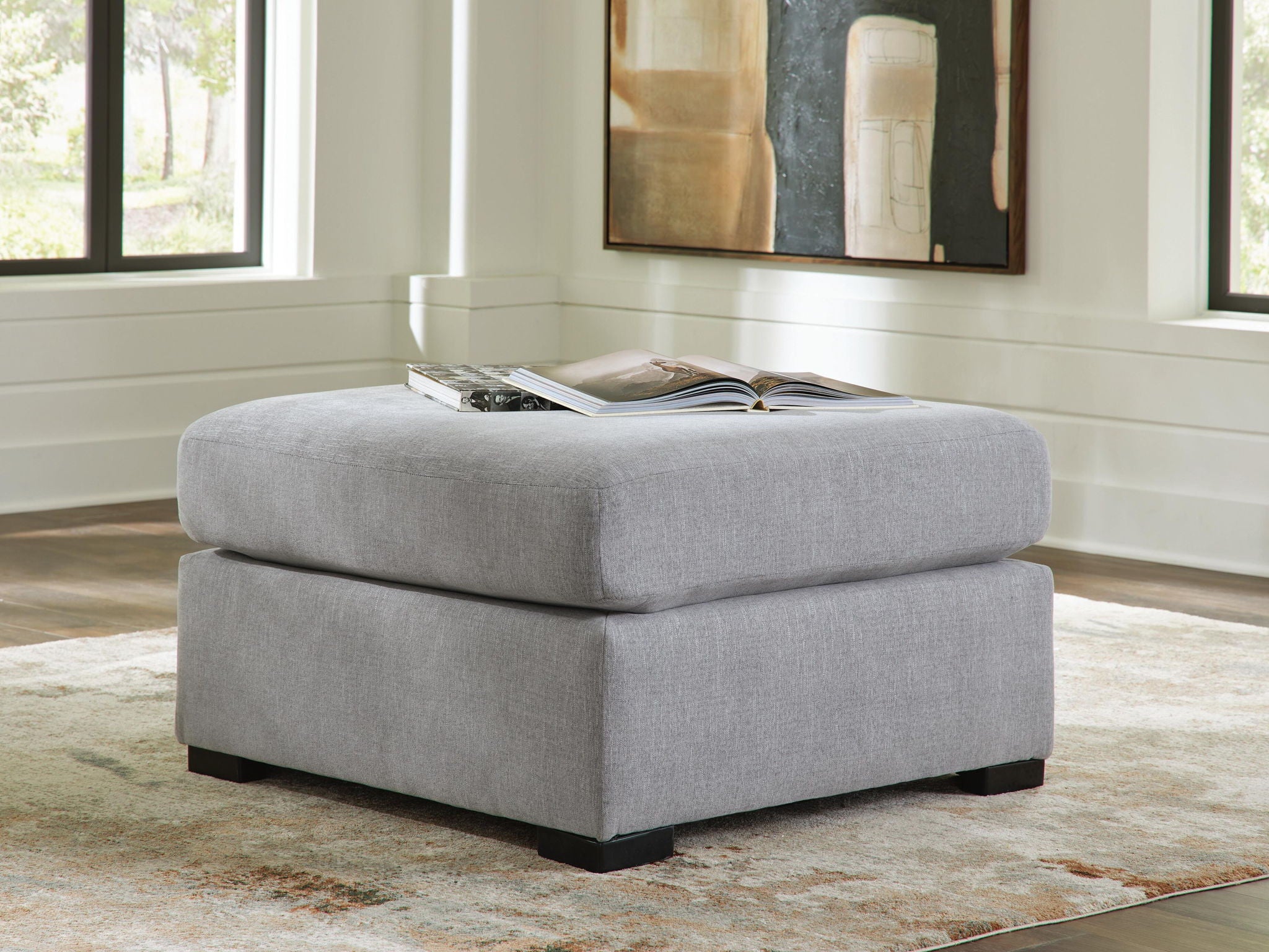 Lakepoint oversized accent ottoman, light gray padded top and boxy base with dark feet