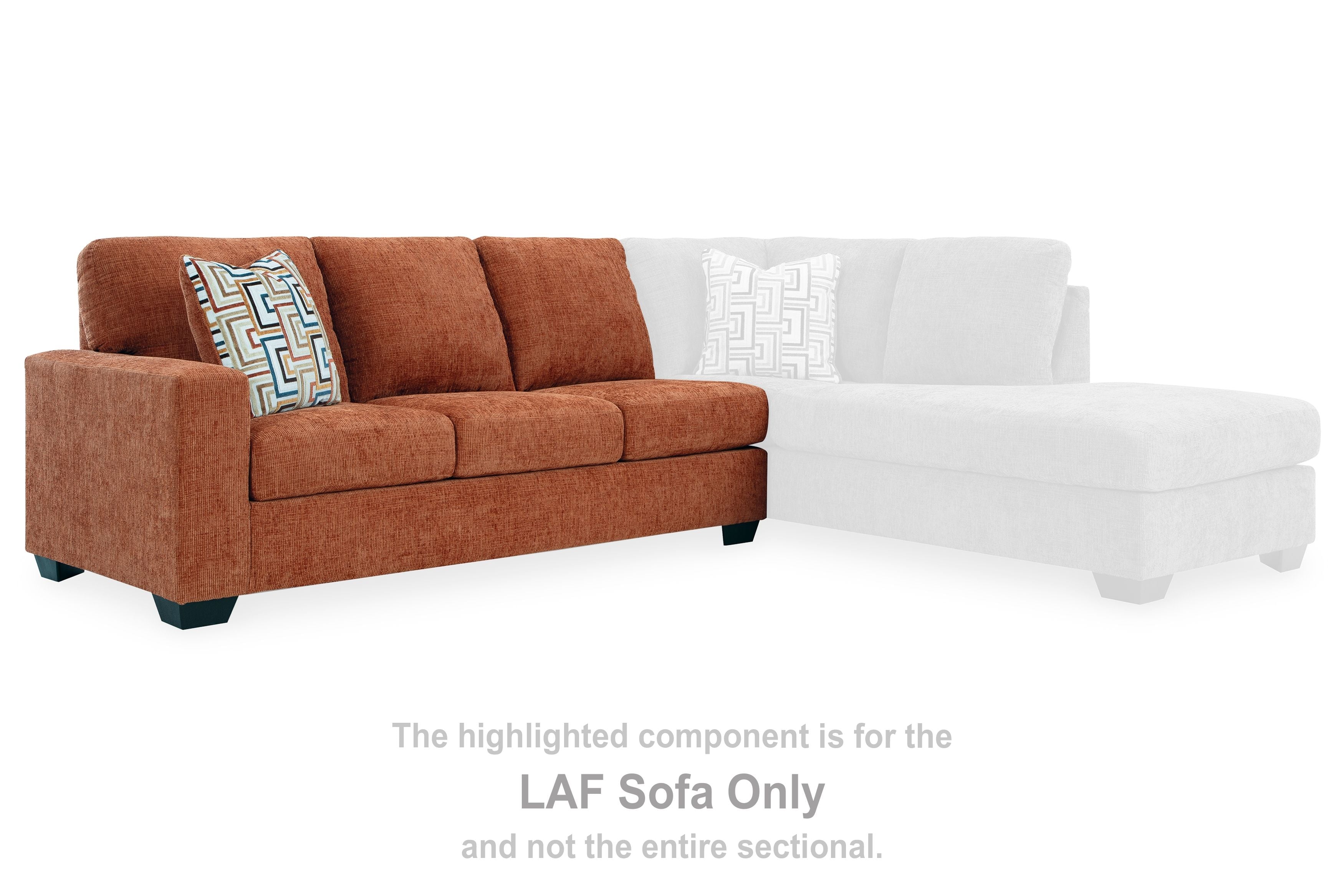 Brown LAF sofa section with white chaise and patterned throw pillow