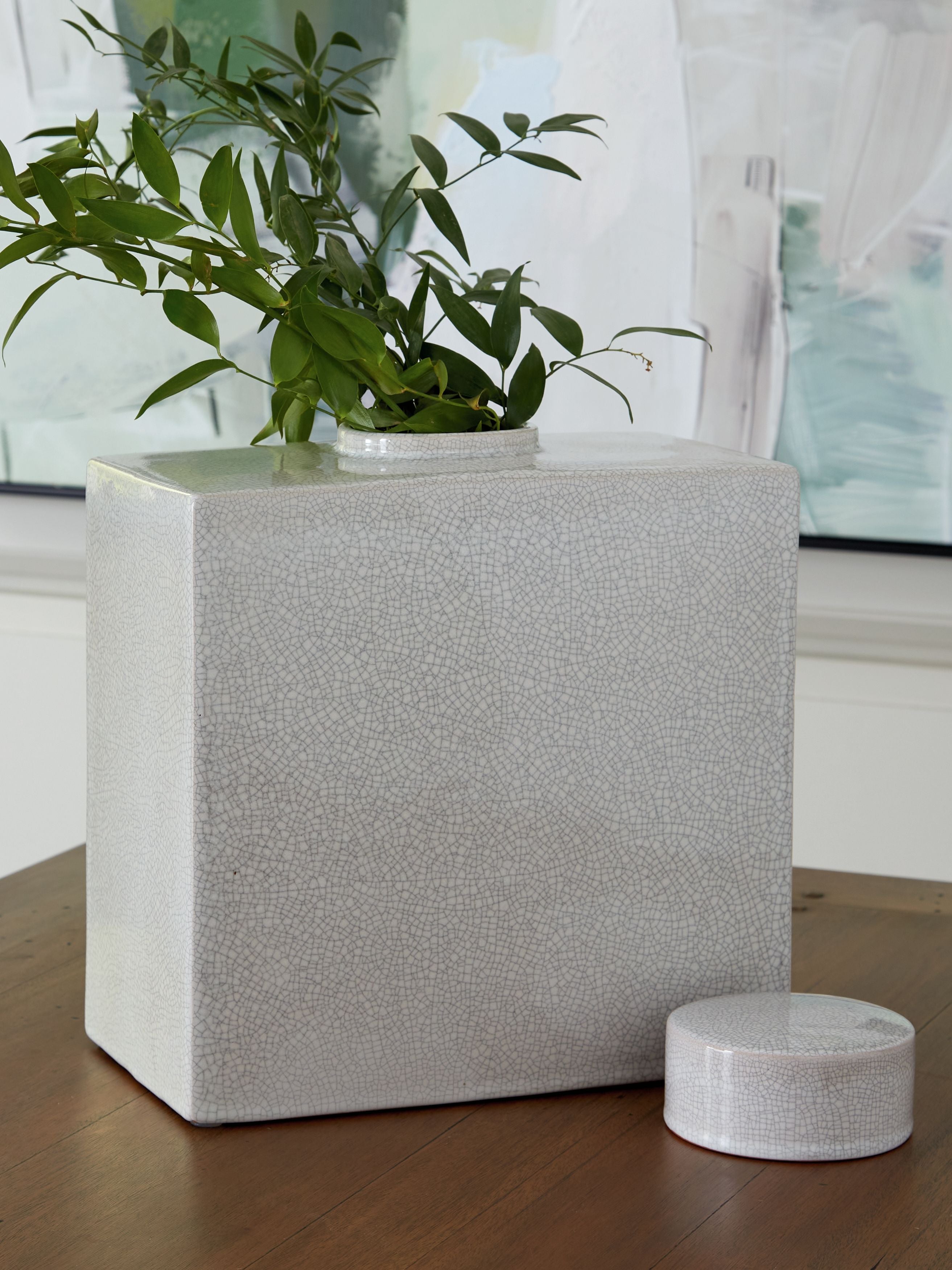Haddworth jar in white crackle ceramic with round lid beside matching small jar