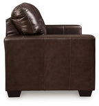 Dark brown leather-look loveseat with tufted back and built-in headrest, squared arms