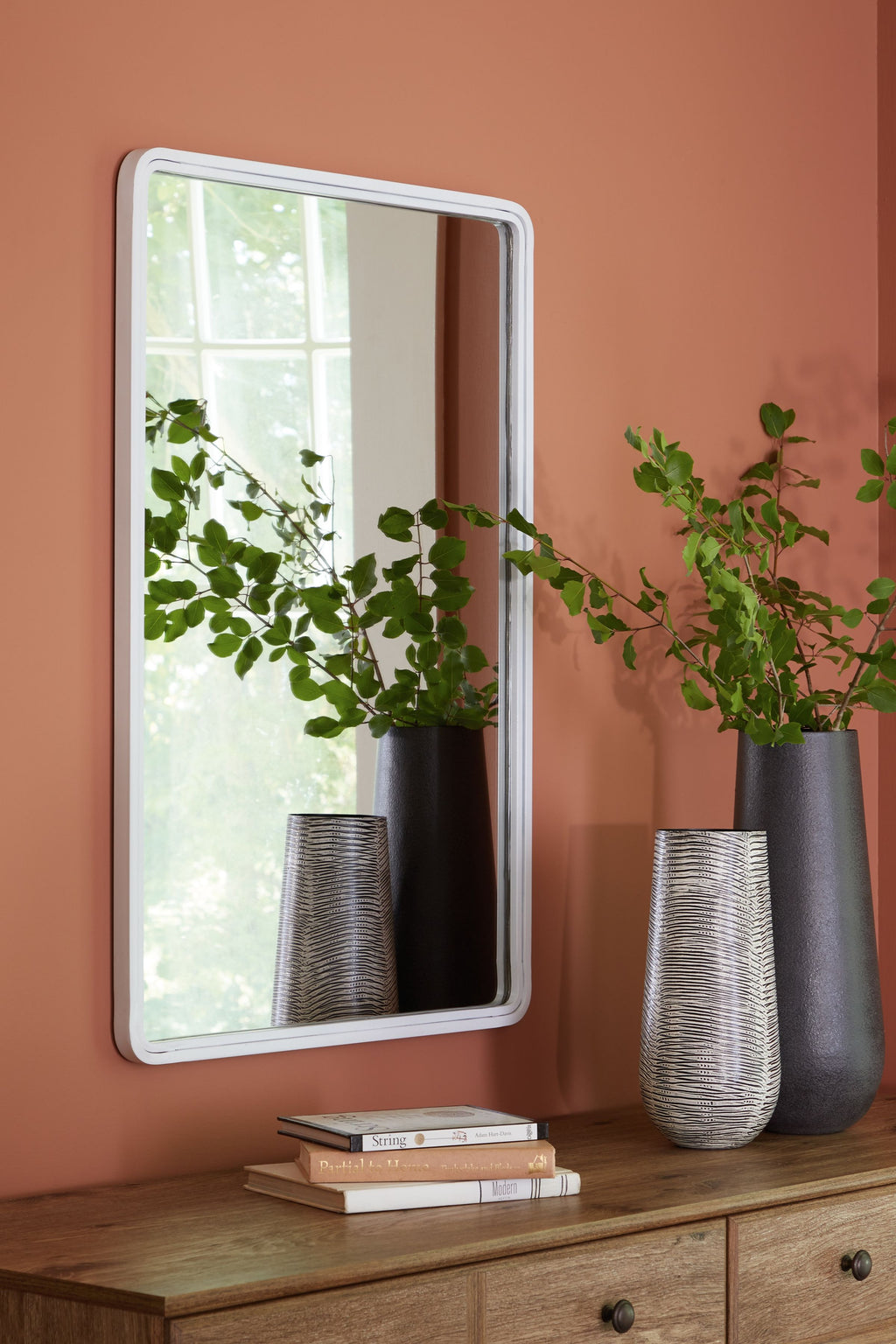 White rectangle accent mirror with rounded corners and thin silver frame