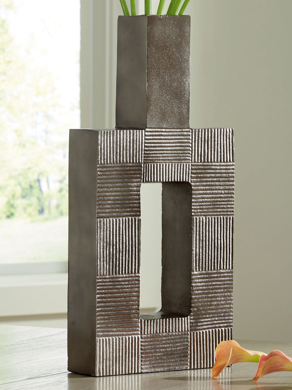 Wrengrove vase in dark gray, open rectangular window framed by mosaic blocks