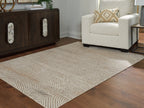 Beige rug with repeating concentric diamond geometric pattern, flatweave surface