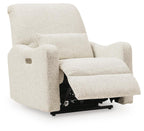 Power recliner chair with extended footrest and light beige upholstery