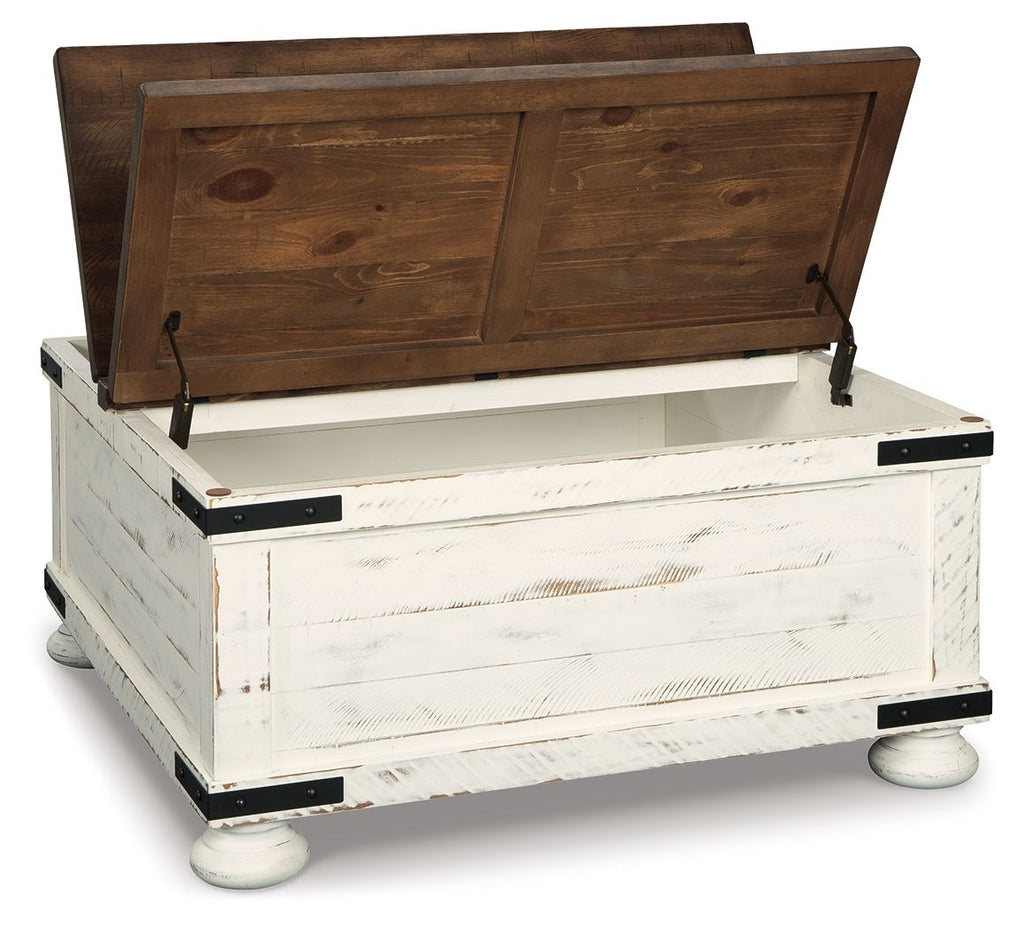 White and brown storage cocktail table with open lid, dark wood interior panel