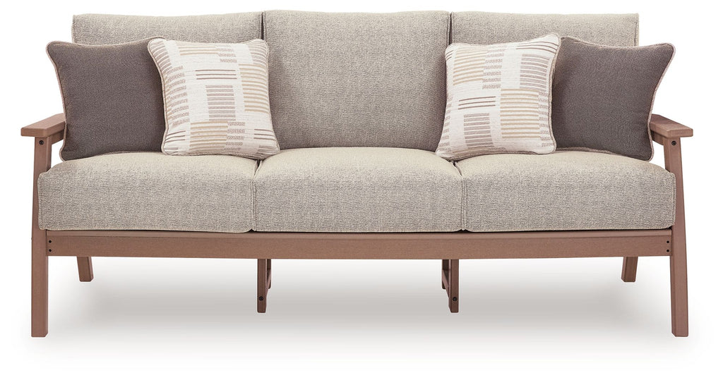 Gray outdoor sofa with three back pillows and two seat cushions