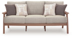 Gray outdoor sofa with three back pillows and two seat cushions