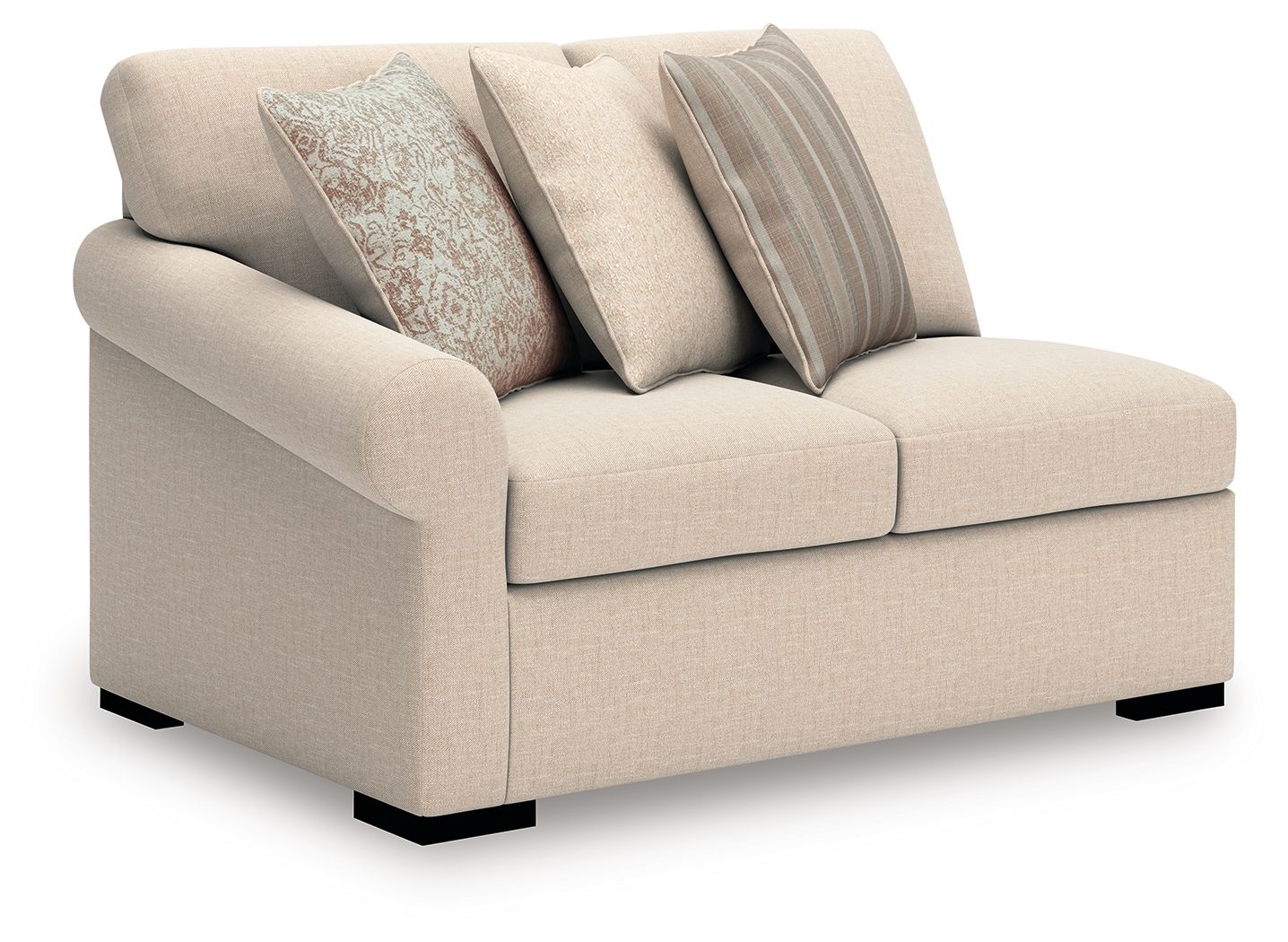 Beige chaise sectional with layered back pillows and dark tapered legs
