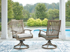 Set of 2 swivel patio chairs with light gray cushions, brown slatted backs and round bases