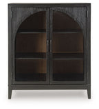 Black bar cabinet with arched double doors and dark interior shelves