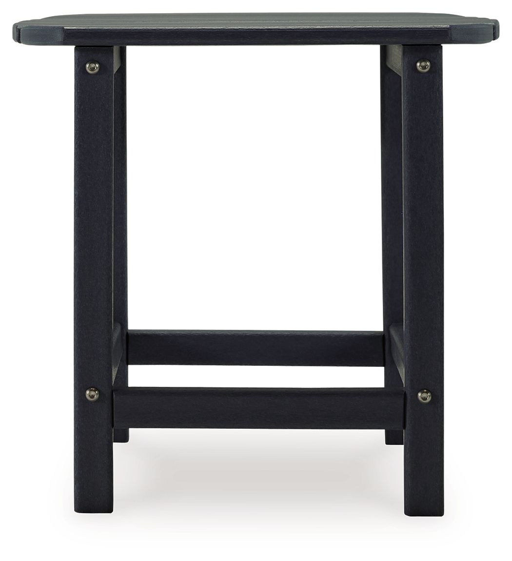 Outdoor end table in dark blue with slatted top and open lower shelf