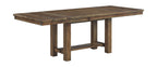 Rectangular dining table with dark wood top and turned legs, sturdy cross braces
