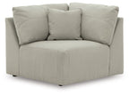 Gray fabric sectional wedge with padded arms and tufted back cushions