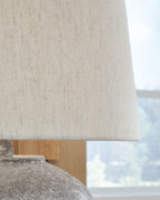 Paper drum shade with close view of textured distressed gray base