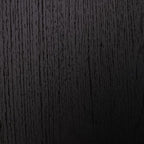 Black headboard wood-grain texture close-up with vertical pattern
