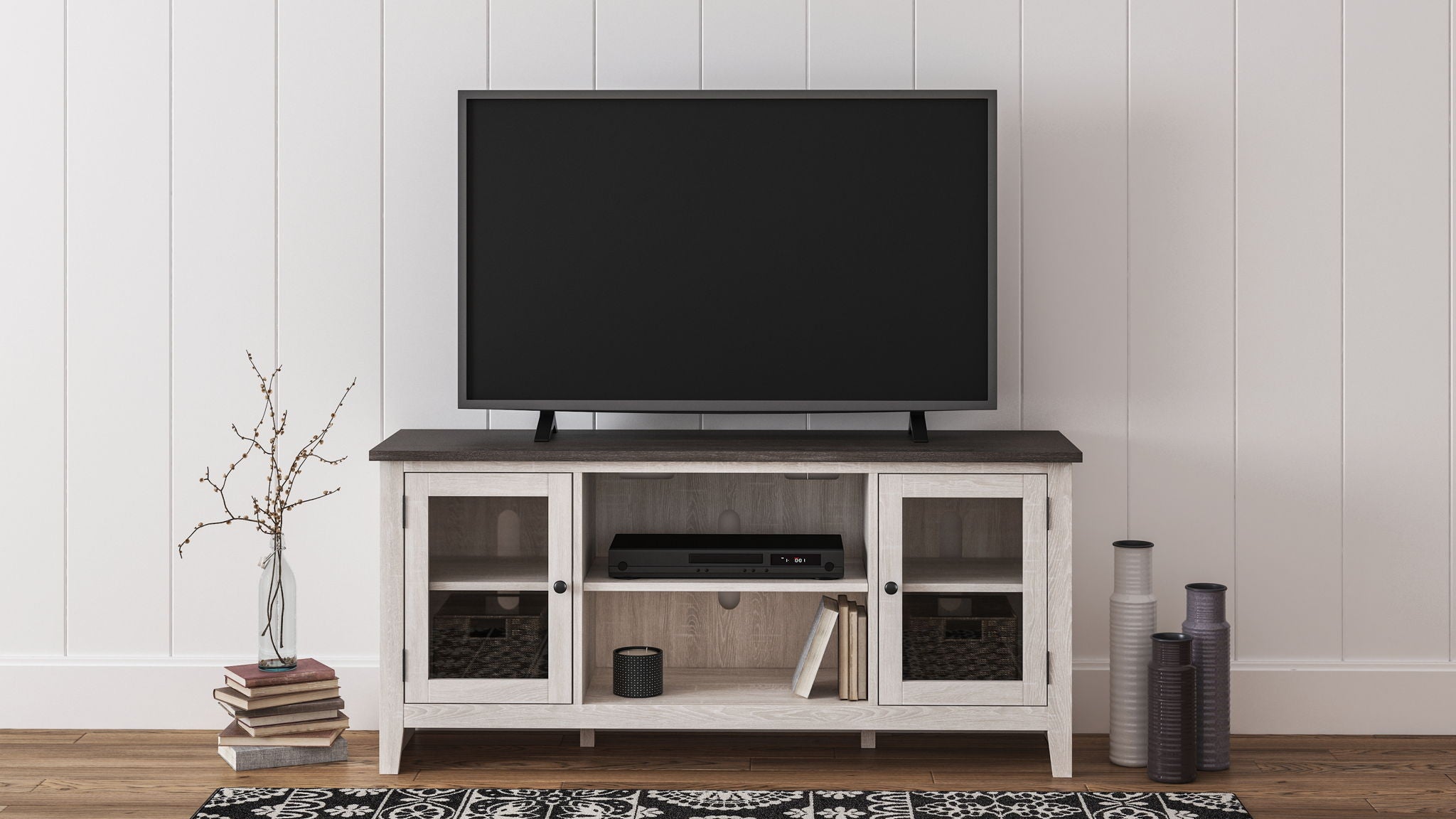 White TV stand with open center shelf and two side cabinets, dark top